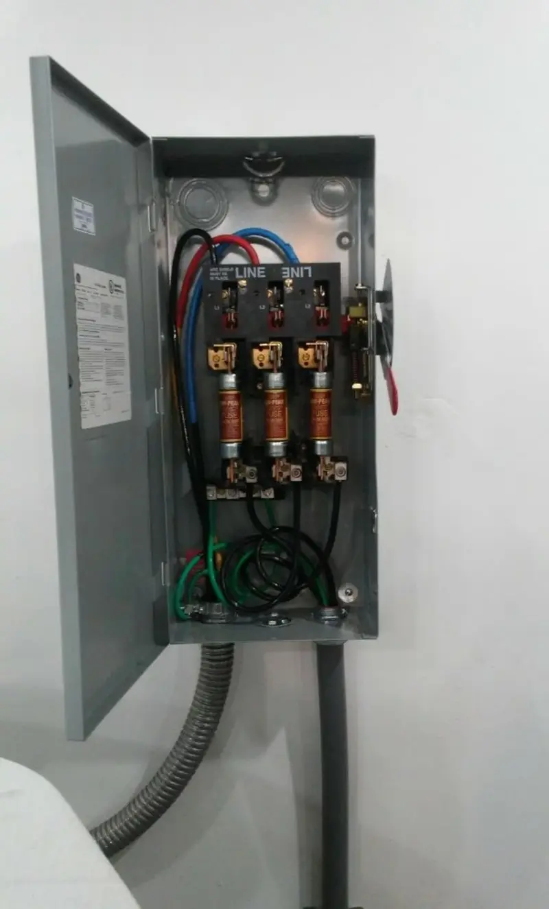 Three-phase disconnect switch installed for Smoke Detector Installation in Tilden